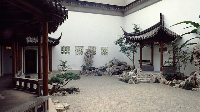 A pagoda with a koi pond