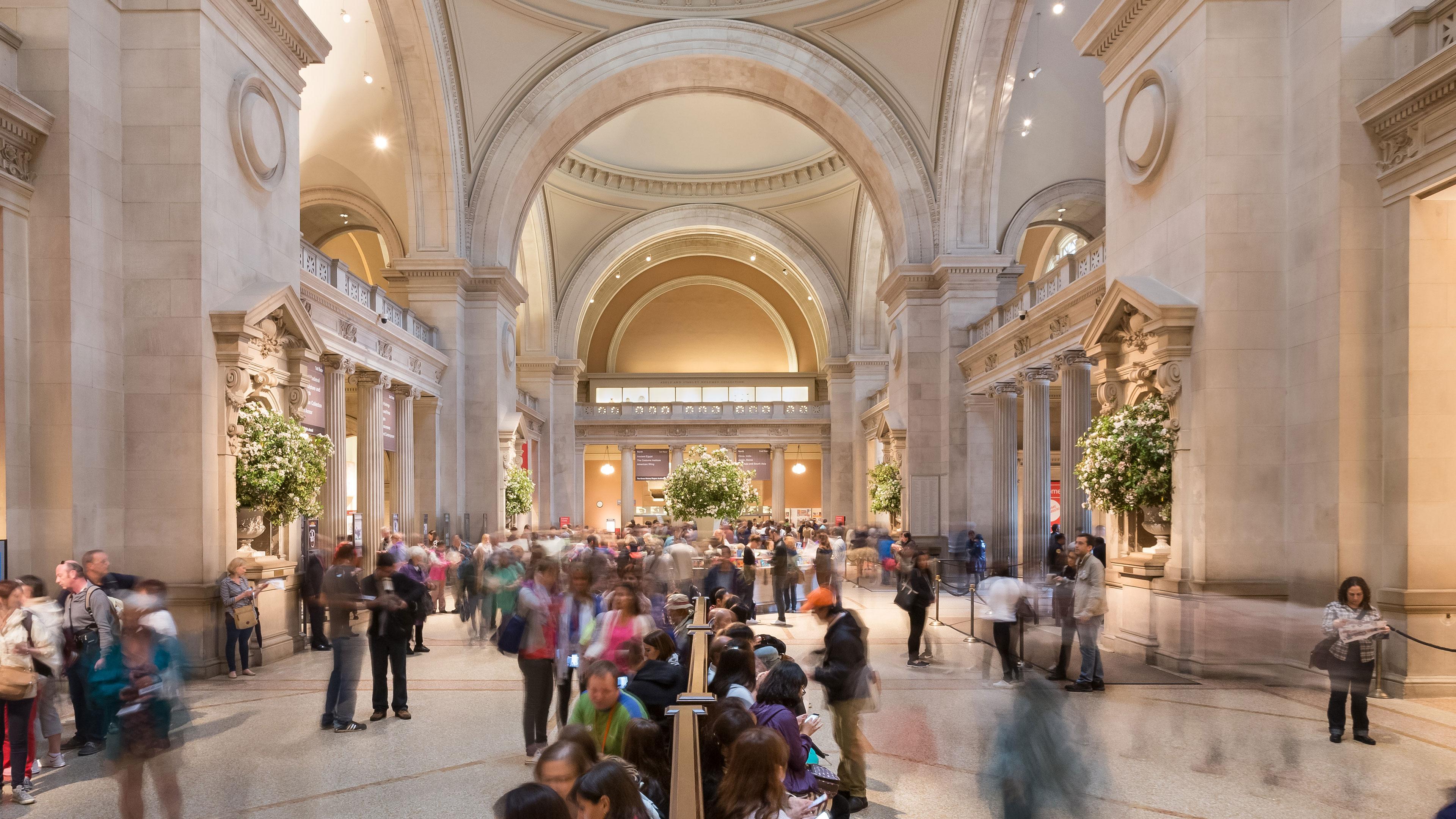 visitors in The Met Fifth Avenue Great Hall entrance