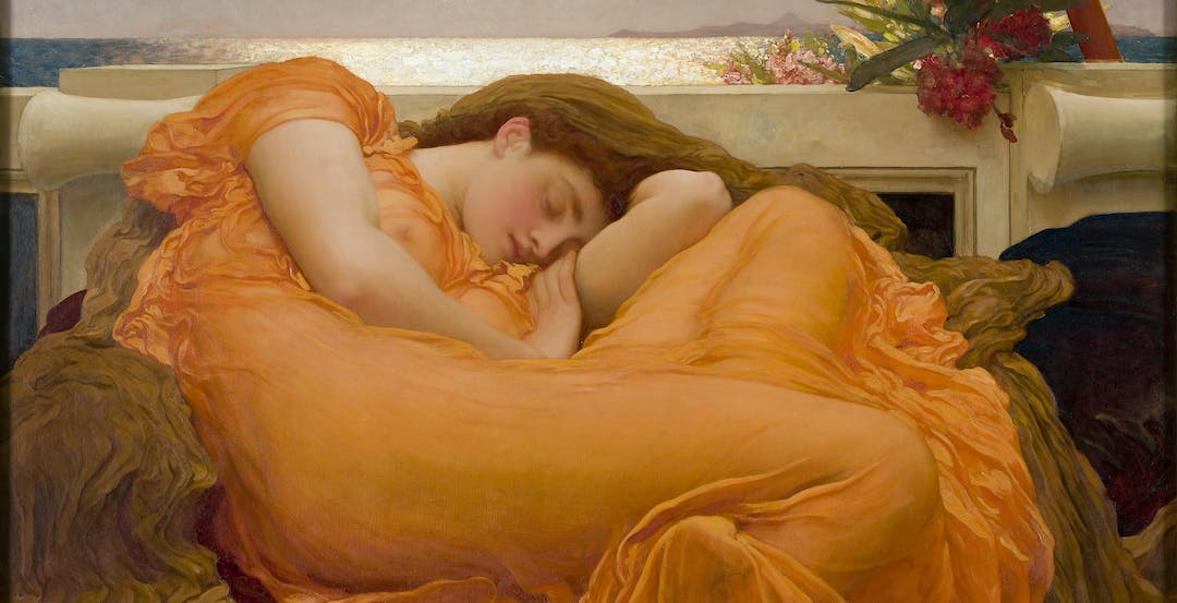 realistic painting of a white women with reddish hair sleeping in a curled up position on a large comfortable looking surface that has maroon red and brown clothe on it. The women is wearing a broad orange dress that is fairly transparent so the outline of her body is prominent. Behind her is a wall and behind that wall is a sunlit reflective body of water with a clear sky. A bright red flower creeps above the wall right above her.  